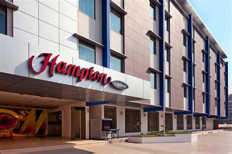 Hampton by Hilton .